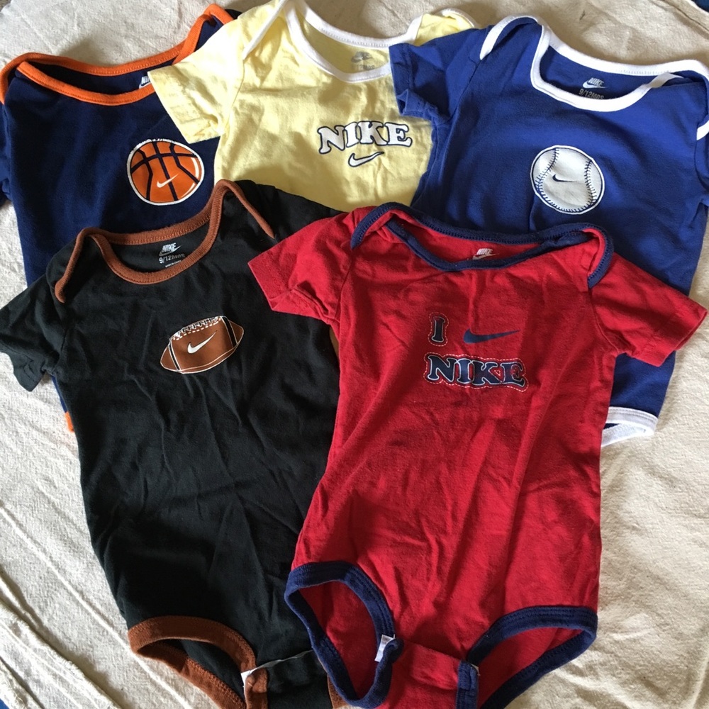 5 Nike onesies